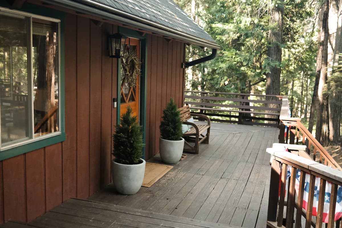 Our. Harming front porch upon entering. All nestled beneath the trees and tucked from the street.